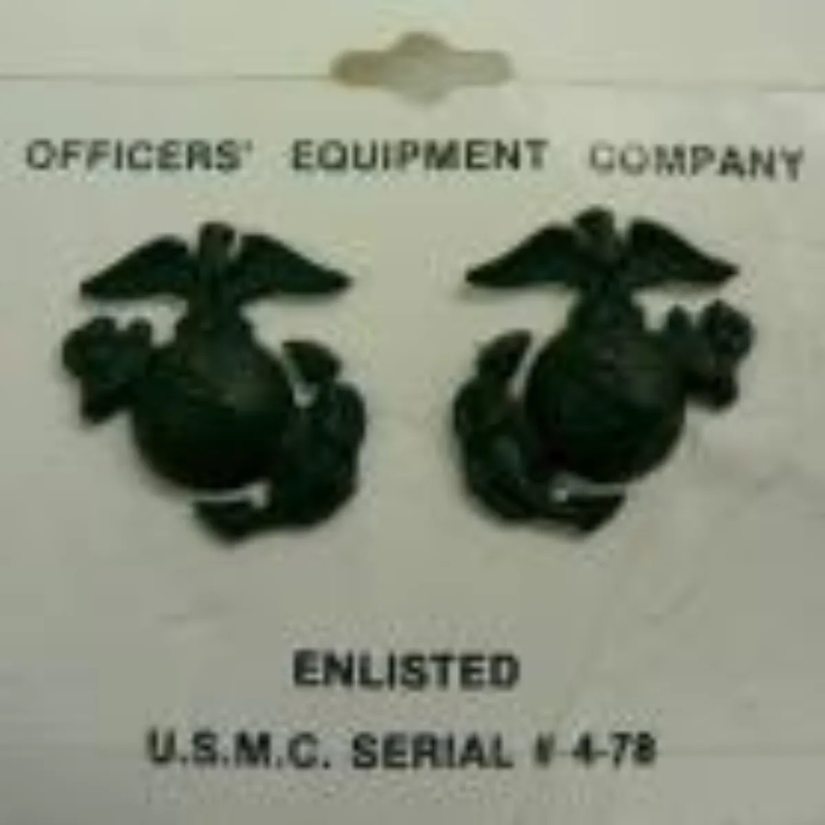 ミリタリーショップ 南国百貨店.COM|沖縄 米軍 記章 USMC ２個１組 黒 [X-033] - 米軍 記章 USM 記録写真1